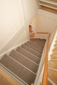 Traprenovatie met woven materiaal