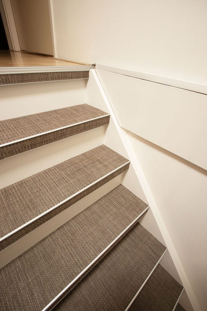 Traprenovatie met woven materiaal