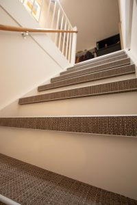 Traprenovatie met woven materiaal