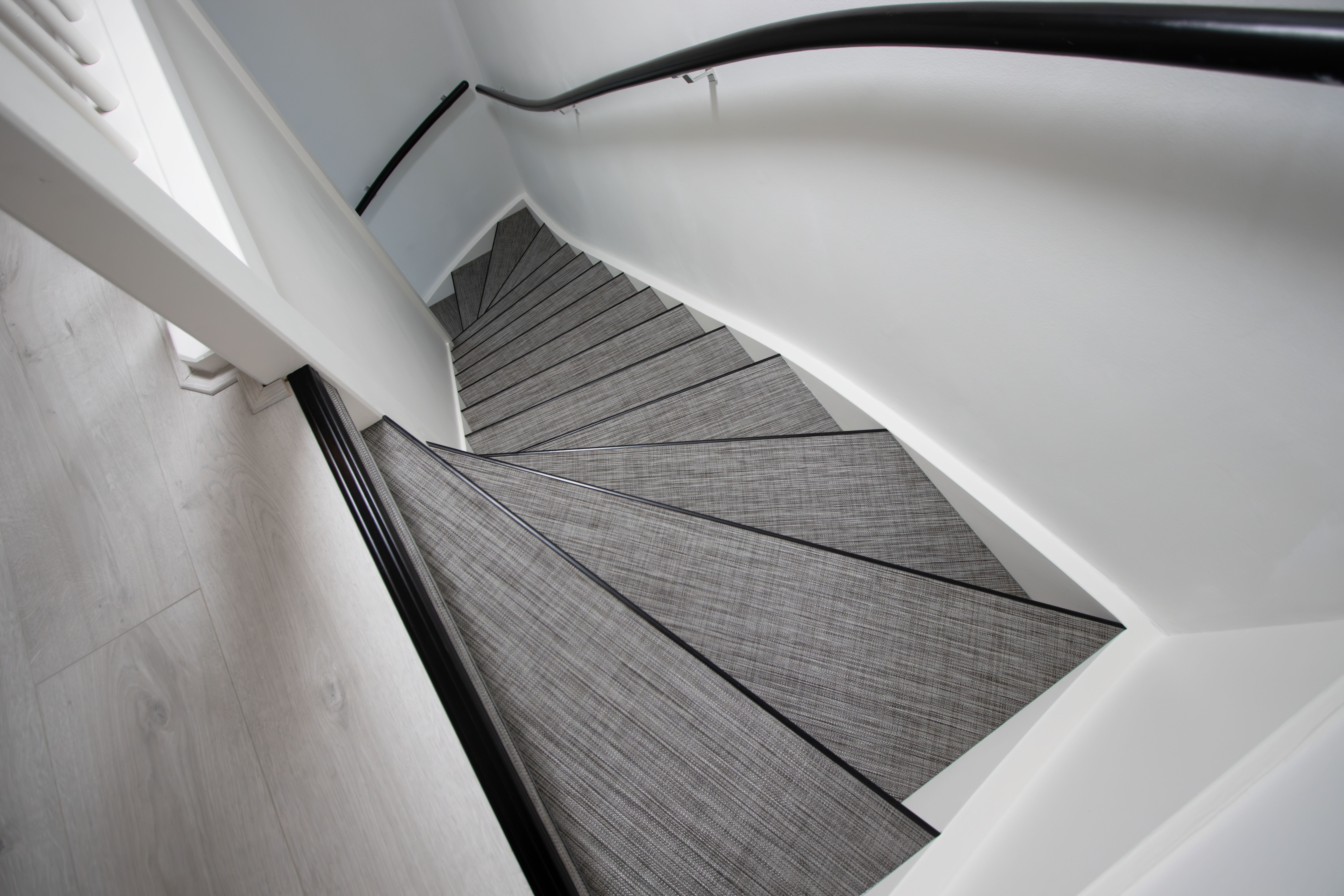 Traprenovatie met woven materialen
